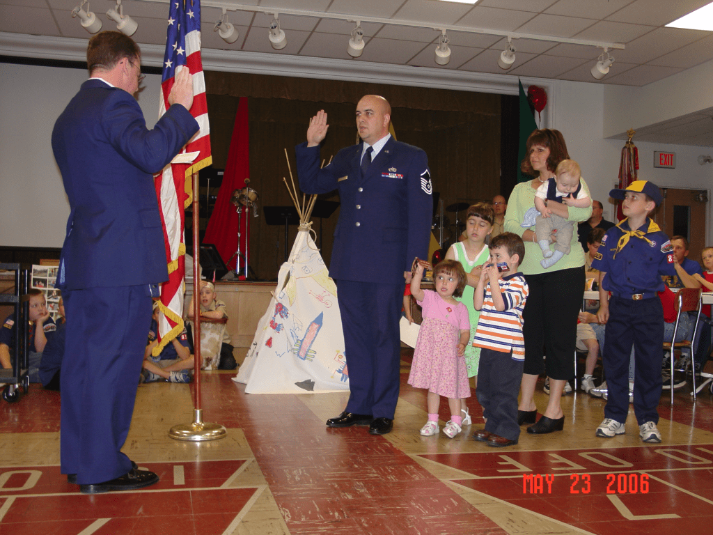 Master Sergeant Gary Barb (center) re-enlisted in the Pennsylvania Air National Guard in 2006 in a ceremony in front of his wife, Patty, and their five children.